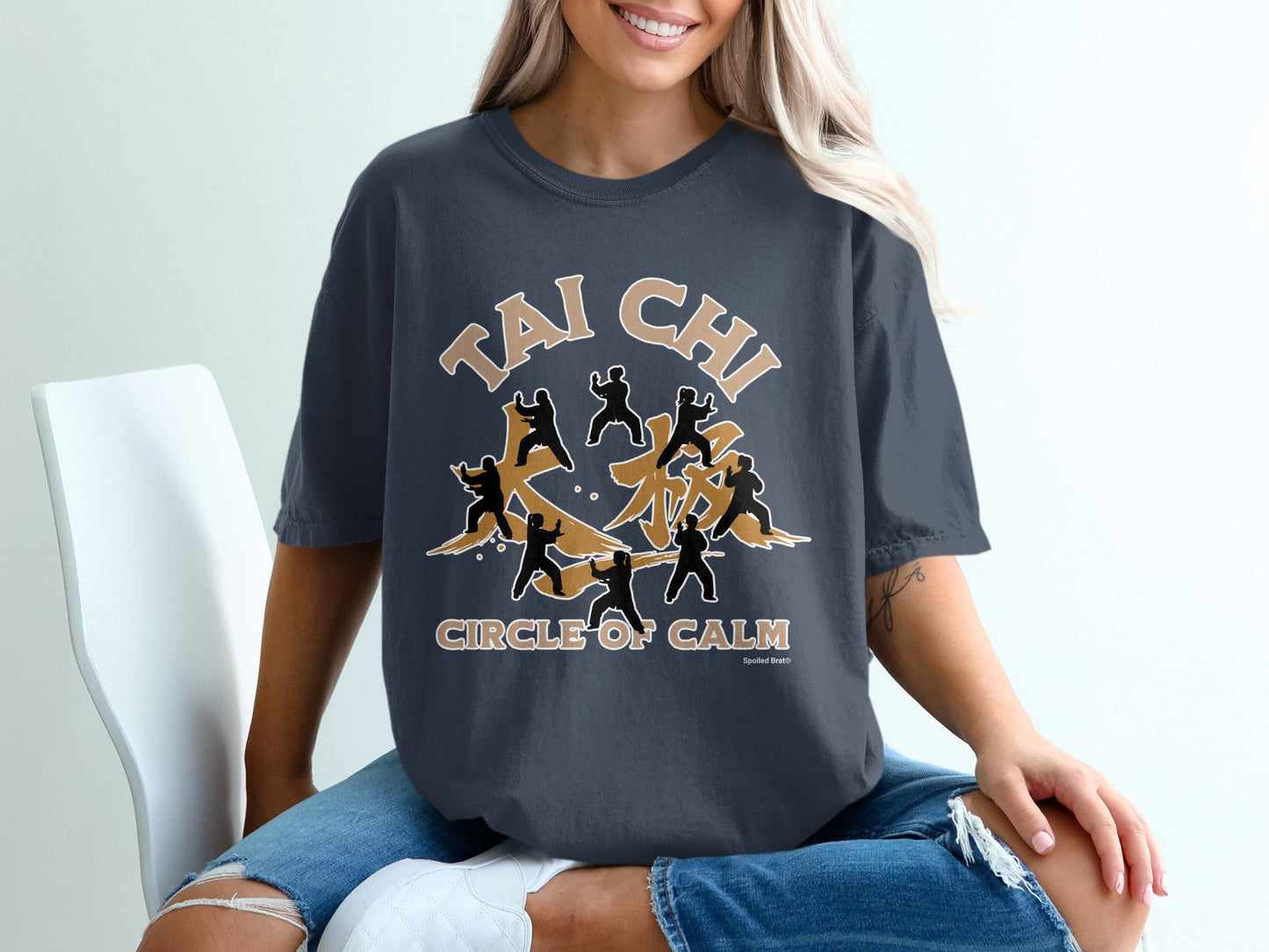 Dark t-shirt with "Tai Chi Circle of Calm" text and martial arts figures.