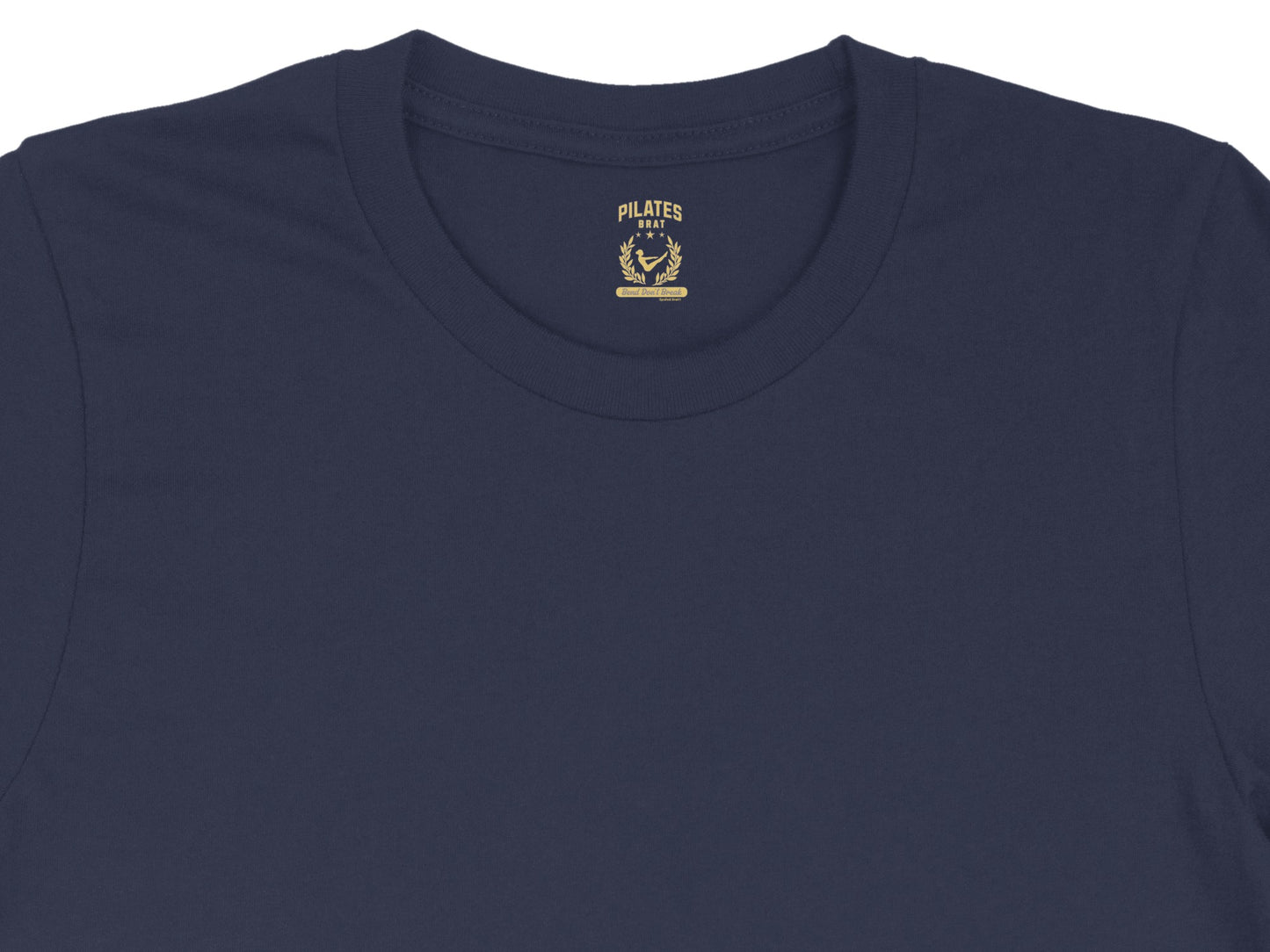 Navy t-shirt with "Pilates Brat" logo featuring a seated figure.