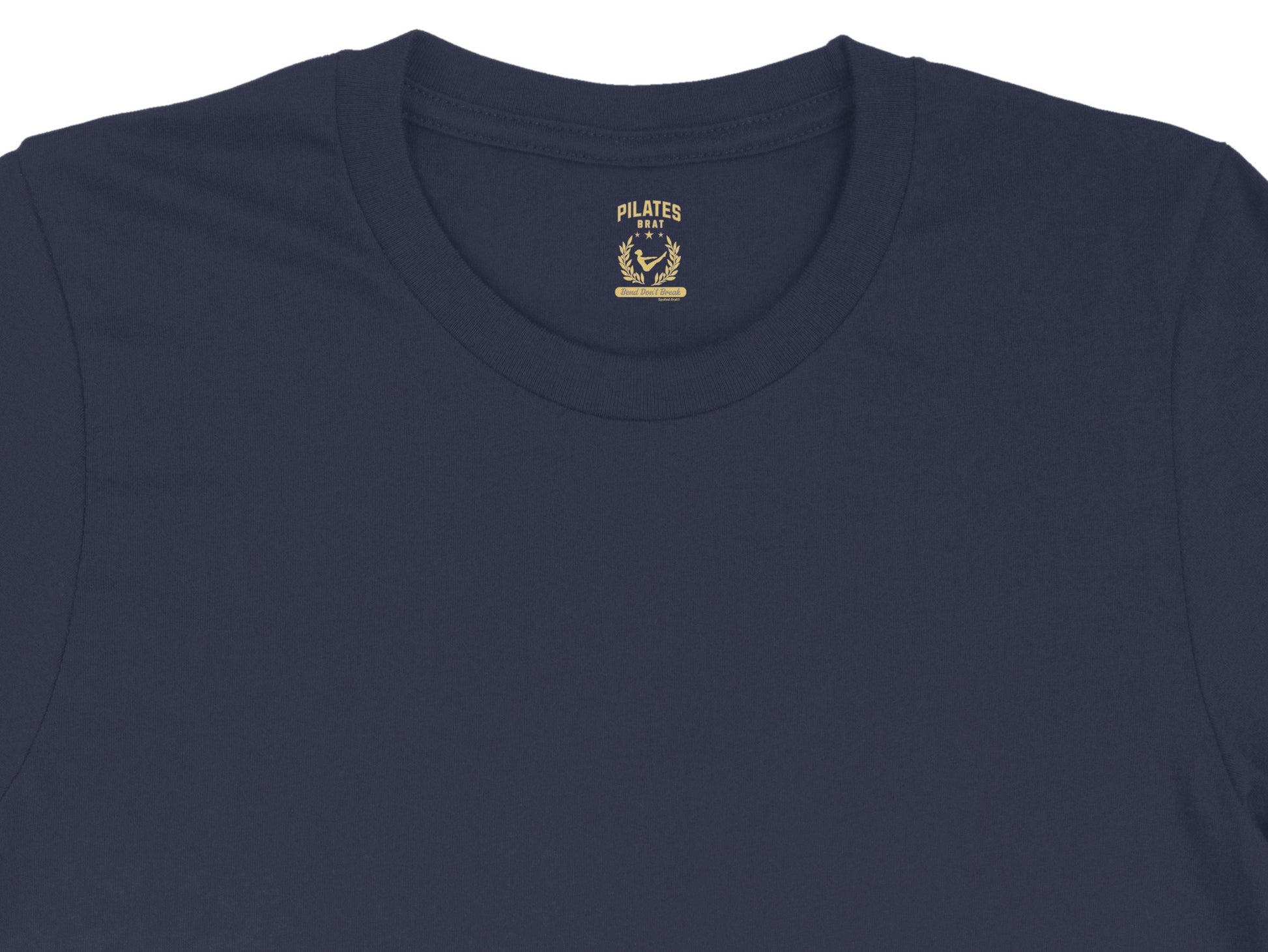Navy t-shirt with "Pilates Brat" logo featuring a seated figure.