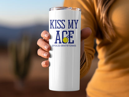 White tumbler with "Kiss My Ace" and "Spoiled Brat Tennis" text, and a tennis ball.