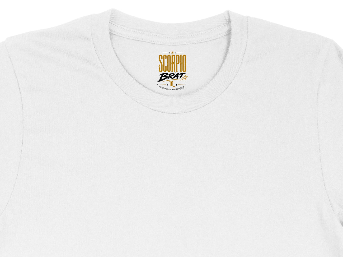 White t-shirt neck tag with "Scorpio Brat" and descriptive text.