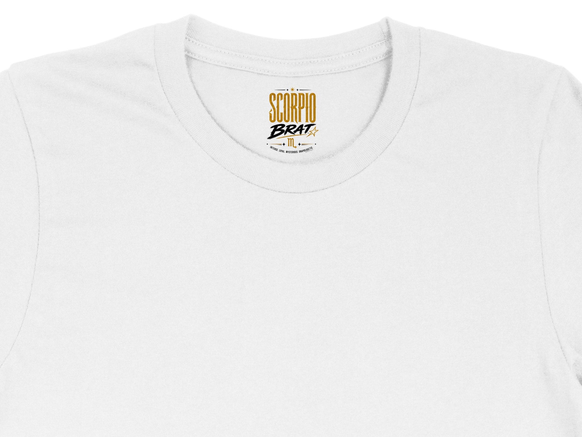 White t-shirt neck tag with "Scorpio Brat" and descriptive text.