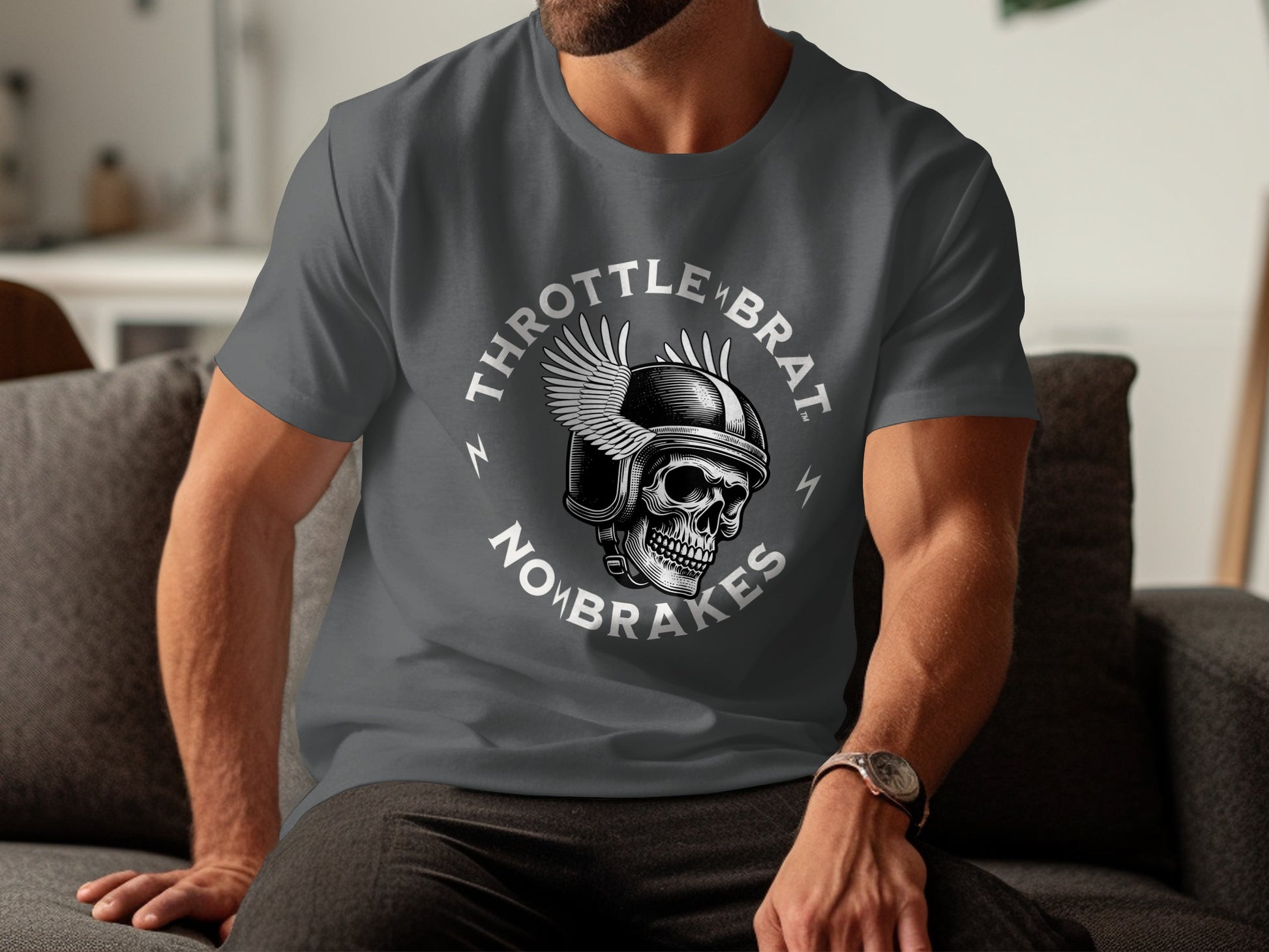 Gray t-shirt with a skull wearing a helmet and wings, text reads "THROTTLE BRAT NOMBRAKES".