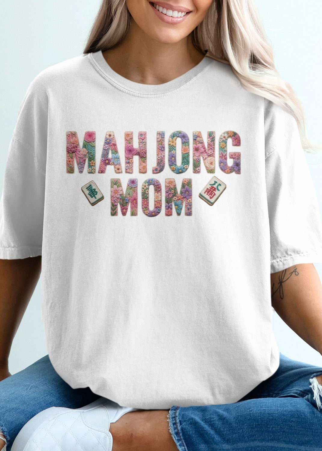 White t-shirt with "Mahjong Mom" and mahjong tiles design.