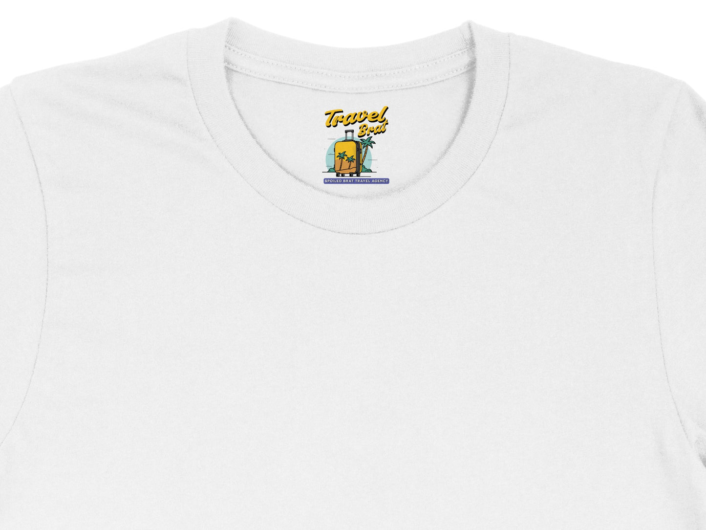 White t-shirt with "Travel Brat" logo featuring suitcase and palm trees.