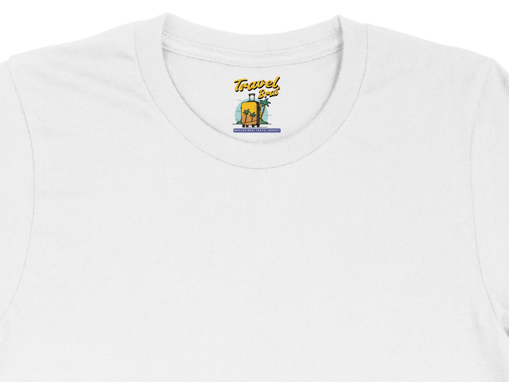 White t-shirt with "Travel Brat" logo featuring suitcase and palm trees.