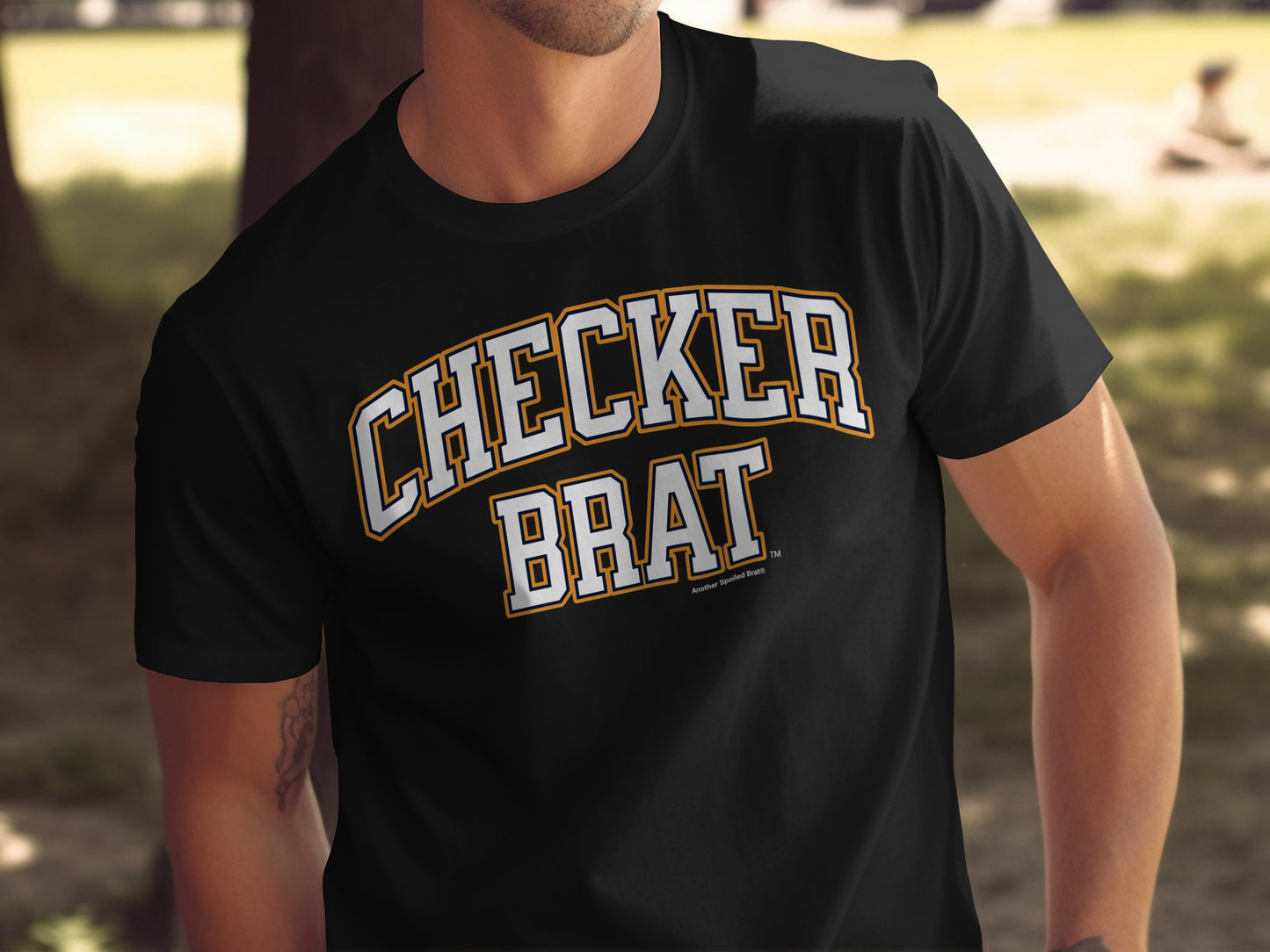 Black t-shirt with "CHECKER BRAT" printed in white and gold collegiate lettering.