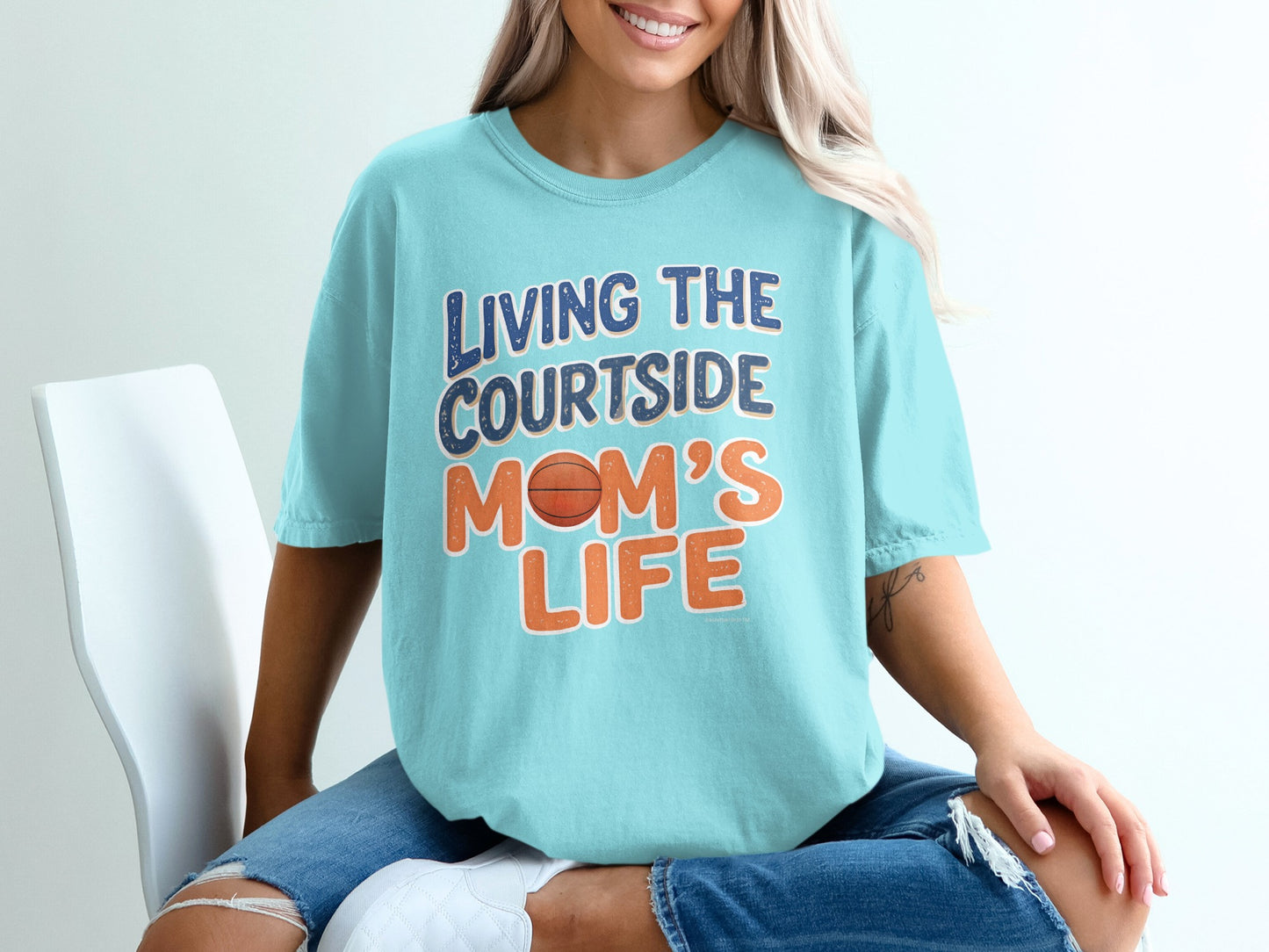 Aqua t-shirt with "Living the Courtside Mom's Life" text and basketball graphic.